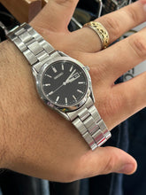 Load image into Gallery viewer, Vintage 2004 Seiko Black Stick Dial Stainless Steel Quartz Watch