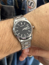 Load image into Gallery viewer, Vintage 2004 Seiko Black Stick Dial Stainless Steel Quartz Watch