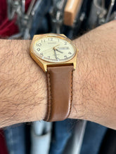Load image into Gallery viewer, Vintage 90s Pulsar Gold Day / Date Quartz Watch
