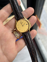 Load image into Gallery viewer, Vintage 2001 Seiko Gold Champagne Dial Mens Quartz Dress Watch
