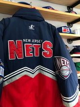Load image into Gallery viewer, Deadstock Vintage Logo Athletic New Jersey Nets Puffer Jacket Size XL
