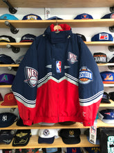 Load image into Gallery viewer, Deadstock Vintage Logo Athletic New Jersey Nets Puffer Jacket Size XL
