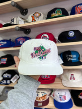 Load image into Gallery viewer, Vintage 1988 Sports Specialties World Series SnapBack
